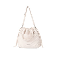 Puffer Drawstring Sling Bag in Whipped Cream