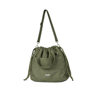 Puffer Drawstring Sling Bag in Pesto Oil