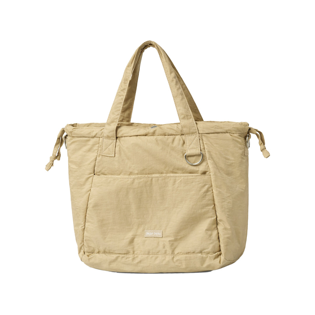 Puffer Drawstring Sling Bag in Cafe Latte