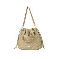 Puffer Drawstring Sling Bag in Cafe Latte